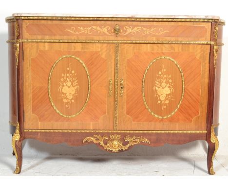 A 20th Century French style marble topped commode / sideboard having twin door cupboards inlaid with central oval panels deco