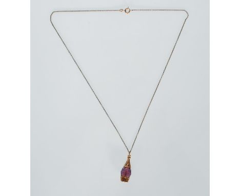 A. Hallmarked 9ct gold and crystal drop pendant strung on a gold plated chain. Hallmarked London.