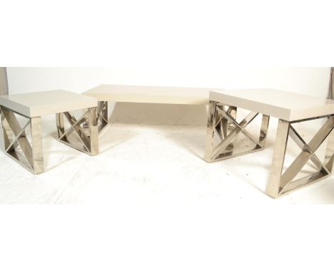 A set of 3 designer modernist composite and chrome side and coffee occasional tables in the manner of Dwell furniture. Each r