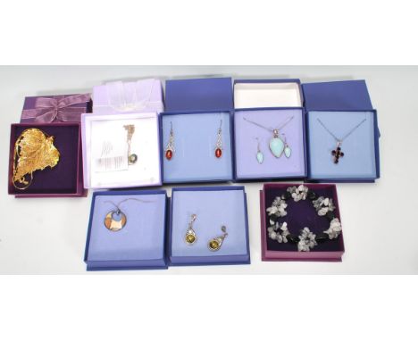 A collection of sterling silver ladies dress jewellery together with costume jewellery to include a silver crucifix pendant s