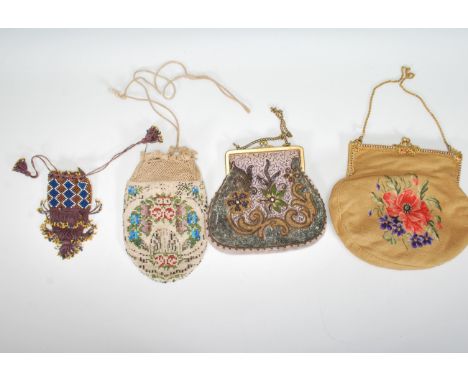 A group of vintage 20th Century evening handbags to include a tapestry bag decorated with a flower to the front having a gilt