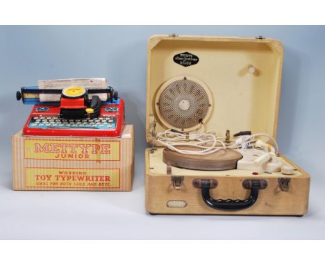 A Vintage mid century childrens tin plate Mettype junior typewriter together with another Mettype and a vintage cased 1960's 