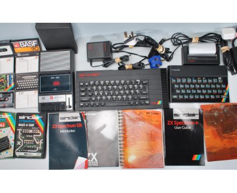 A vintage Sinclair ZX Spectrum games console together with a ZX Spectrum + 128k,&nbsp; with user manuals and a collection of 