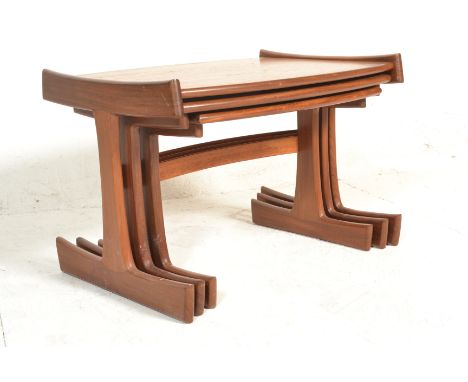 A 1970 retro vintage Gplan ' Katrina ' teak wood nest of tables having graduating sizes. The legs having an ' I ' shape with 