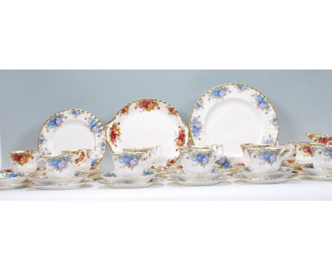 A Royal Albert&nbsp; Moonlight Rose pattern part tea service comprising cups, saucers, plates etc together with a collection 