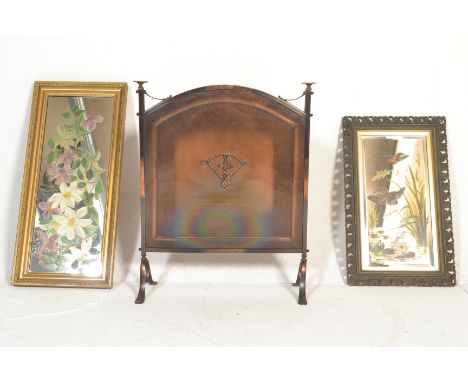 A mid 20th Century copper style fire screen with central applied decoration raised on scroll feet. Together with two vintage 