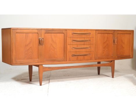 Victor. B. Wilkins - G Plan - Fresco range - A 1960's retro vintage teak wood credenza sideboard. The sideboard comprising a 