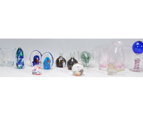 A mixed collection of glass ware to include Millennium Pebble Caithness paperweight, matching pair of Madina paperweights, Co