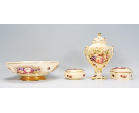 A selection of Aynsley Orchard Gold pattern ceramics printed with peaches and grapes on a yellow ground, each marked D Jones 