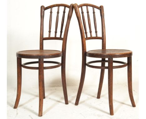 A pair of vintage 20th Century Circa 1920's bentwood Thonet bentwood Cafe / bistro chairs, circular seat pads with applied Th