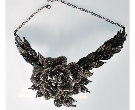 A Butler and Wilson fashion jewellery collar choker necklace in the form of a rose set with black and white Swarovski crystal