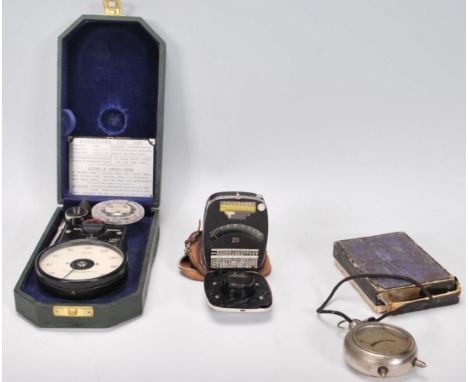 A group of three vintage 20th Century meters / gauges to include a electro BEWI lightmeter, a J T pocket voltmeter in its ori