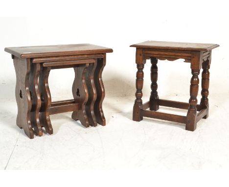 A 1920's oak peg jointed stool raised on turned legs with block feet united by stretchers. Carved frieze with flared top abov