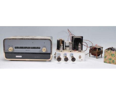 A vintage 20th Century valve amp together with a cased valve amplifier bearing no model number.&nbsp;