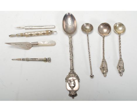 A selection of 20th Century silver items to include a silver hallmarked trowel bookmark having a mother of pearl handle (hall