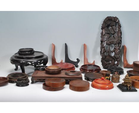A good selection of 20th Century Chinese&nbsp;stands of varying sizes to include a rectangular example raised on four feet, r