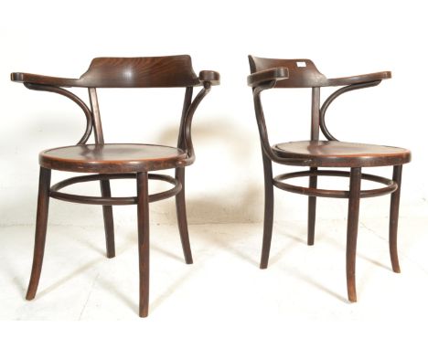 A pair of early 20th century antique vintage Kohn ' Mazowia ' cafe chairs / armchairs in the manner of Thonet having bentwood