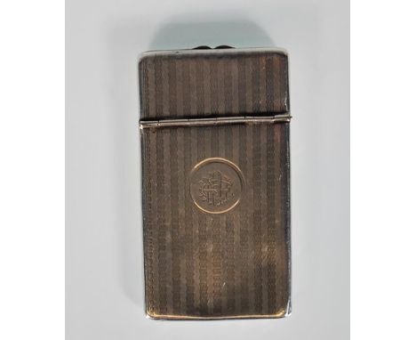 An early 20th Century Wilmot Manufacturing Co silver hallmarked card case having engine turned decoration and a round panel t