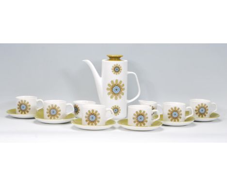 A vintage retro 1970's J &amp; G Meakin coffee service consisting of six tea cups and saucers, creamer jug, sugar bowl and co