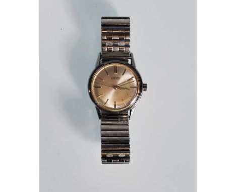 A vintage 1960's Roamer waterproof wrist watch having a silvered dial with baton numerals to the chapter ring, Swiss made, on