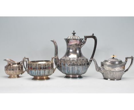 A Walker &amp; Hall Victorian&nbsp; 19th century silver plated 4 piece tea service comprising teapot. sugar bowl with twin ha