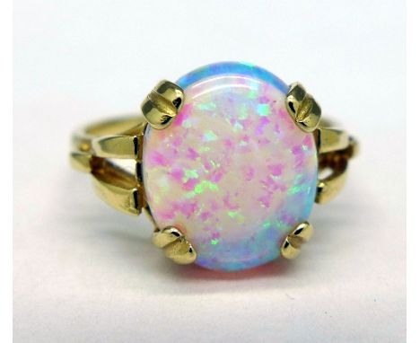 A 9ct gold and synthetic opal ring, weight 2.7g, size P