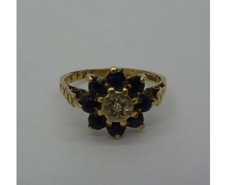 A 9ct gold, diamond and sapphire ring, weight 1.8g, size J