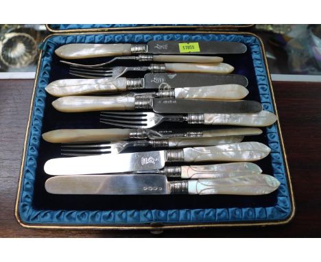 Silver Bladed Knife and fork set with mother of Pearl Handles London 1894 with engraved H and Crown 