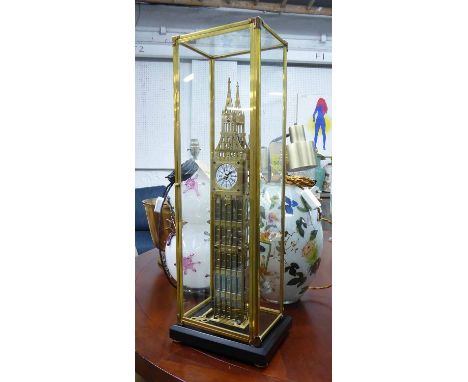 SKELETON CLOCK, contemporary brass in Queen Elizabeth tower form, 24cm x 17cm x 70cm.