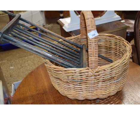 A wicker basket and a vintage wooden over bath shelf