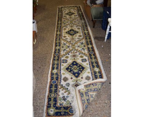 A pale runner carpet