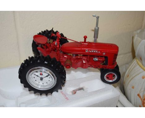 Model of a Farmall tractor