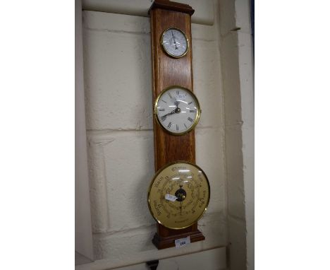 Modern thermometer, barometer and clock combination