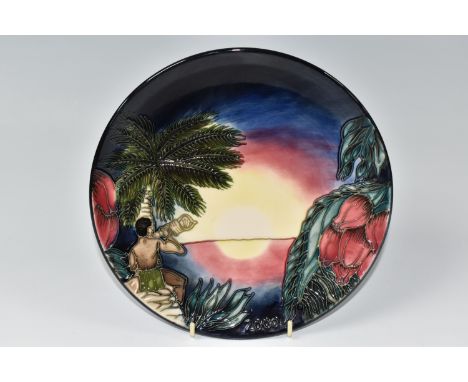 A MOORCROFT POTTERY LIMITED EDITION 'BIRTH OF LIGHT' 2000 YEAR PLATE, 323/2000, decorated with a tropical island scene, impre