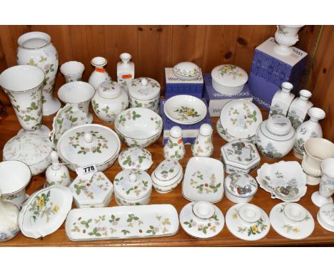A LARGE COLLECTION OF WEDGWOOD GIFTWARE ITEMS to include a large quantity of 'Wild Strawberry' items to include four lidded t