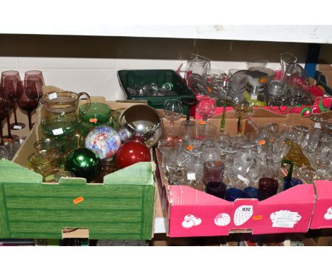 FIVE BOXES AND LOOSE GLASSWARE to include a box of glass stoppers, eight purple glass wine glasses, two boxes of mostly clear