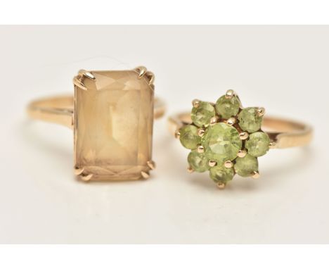 TWO 9CT GOLD GEM SET RINGS, to include a peridot cluster ring, together with a Citrine single stone ring, ring sizes L and L 