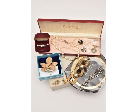 AN ASSORTMENT OF JEWELLERY, to include a large 'Monet' chain bracelet, a 'Monet' cleopatra style necklace, an 'Exquisite' lea