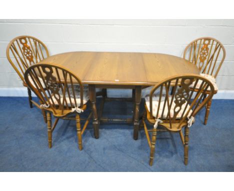 A LATE 20TH CENTURY OAK OVAL GATE LEG TABLE, extended length 177cm x closed width 64cm x depth 90cm x height 77cm, a set of f