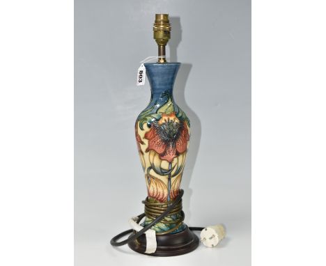 A MOORCROFT POTTERY 'ANNA LILY' TABLE LAMP, designed by Nicola Slaney, of bottle form, tube lined in the Anna Lily pattern, o