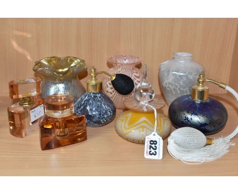 A GROUP OF DECORATIVE GLASS WARE, comprising a yellow scent bottle with etched design, Royal Brierley and Caithness atomisers