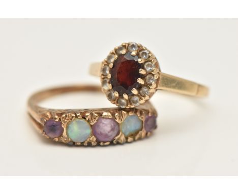 TWO 9CT GOLD GEM SET RINGS, the first set with three circular cut amethyst and two opal cabochons, scrolling gallery and poli