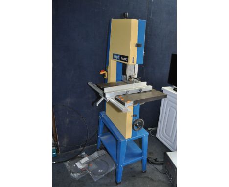 A SCHEPPACH BASATO 3 BANDSAW ON STAND with parallel and mitre guides along with spare blades, 12in throat, total height 170cm
