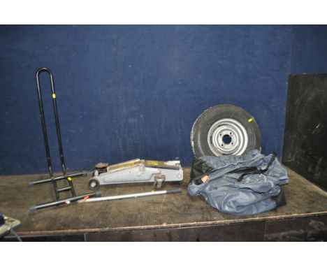 A MASTER CRAFTS 2 TON TROLLEY JACK with handle, a bike stand, an Oxford 7-41 motorbike cover and a 'Mini' 11in wheel and tyre