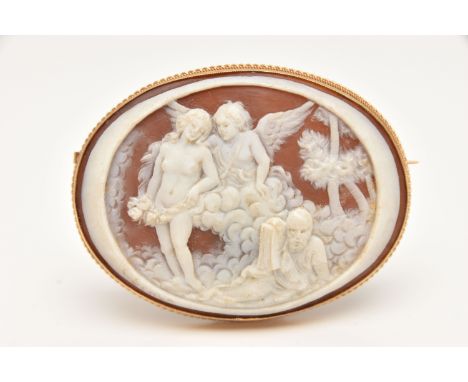 A 9CT GOLD CAMEO BROOCH, of an oval form, carved shell depicting a mythical scene, collet set within a rope twist surround, f