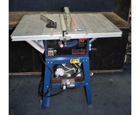 A CLARKE CTS10D TABLE SAW ON STAND, with two extensions to table, parallel and mitre guides (PAT pass and working)