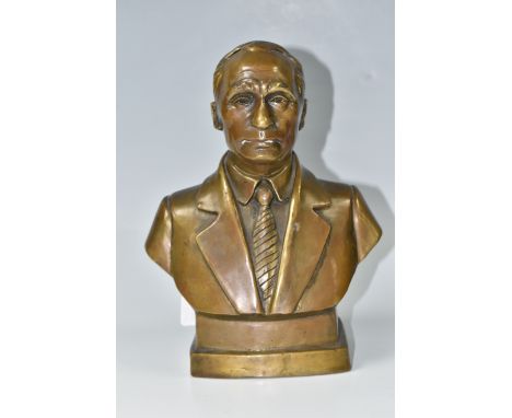 A BRONZED BUST OF VLADIMIR PUTIN, depicting the Russian president wearing a suit and tie, titled verso, height 25cm (1) (Cond
