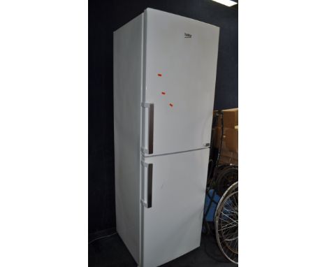 A BEKO CFP3691VW FRIDGE FREEZER, width 60cm, depth 65cm, height 190cm (PAT pass and working)