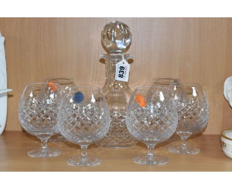 A KINGSWINFORD CUT CRYSTAL DECANTER WITH SIX MATCHING BRANDY GLASSES comprising a bulbous decanter with original stopper, and