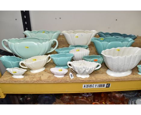 A COLLECTION OF 'SHELL AND FANNED' SHAPED VASES comprising six large vases (approximate height 16cm x width 35cm), eight medi